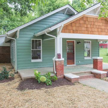 Front elevation with cedar shakes and siding in Sherman Williams Privilege Green