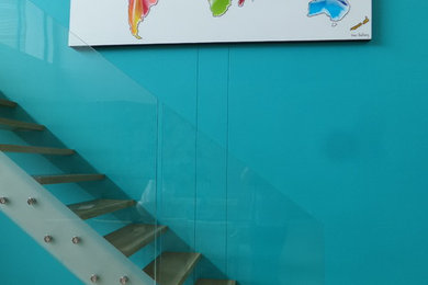 Inspiration for a large contemporary staircase remodel in Other
