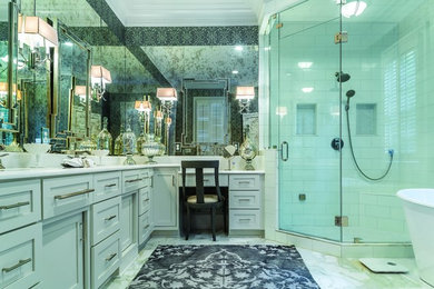 Photo of a mid-sized transitional master bathroom in Atlanta with shaker cabinets, white cabinets, a freestanding tub, a corner shower, white tile, subway tile, multi-coloured walls, marble floors, an undermount sink and marble benchtops.