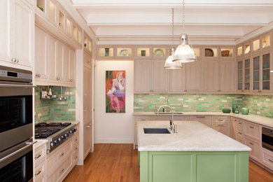 Eat-in kitchen - contemporary eat-in kitchen idea in San Francisco with green backsplash, ceramic backsplash, stainless steel appliances and an island