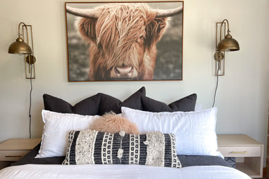 Inspiration for a rustic bedroom remodel in Austin