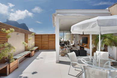 Example of a large minimalist exterior home design in Other
