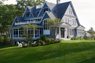 Large coastal blue four-story wood and shingle house exterior idea in Portland Maine with a shingle roof