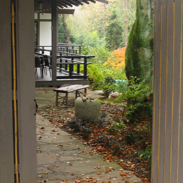 Glimpse of rear Japanese garden through gate