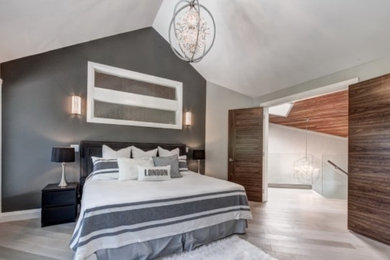 Example of a transitional bedroom design in Calgary