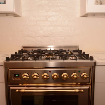 Calacatta Gold Marble & White Cabinets