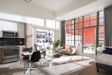 Example of a trendy family room design in Louisville