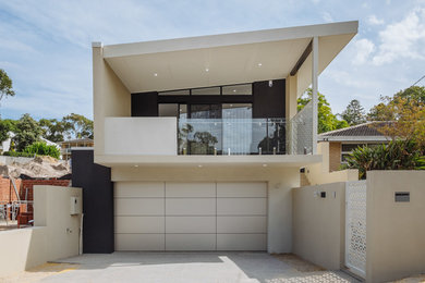 Design ideas for a mid-sized modern two-storey exterior in Perth.