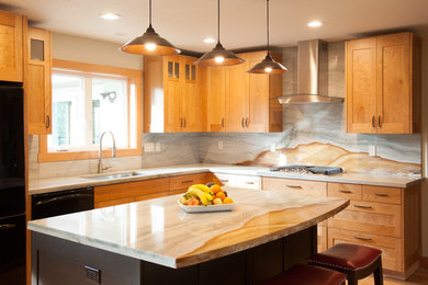 Inspiration for a mid-sized arts and crafts l-shaped kitchen in Sacramento with with island, an undermount sink, shaker cabinets, light wood cabinets, quartzite benchtops, stone slab splashback, black appliances, light hardwood floors and multi-coloured floor.