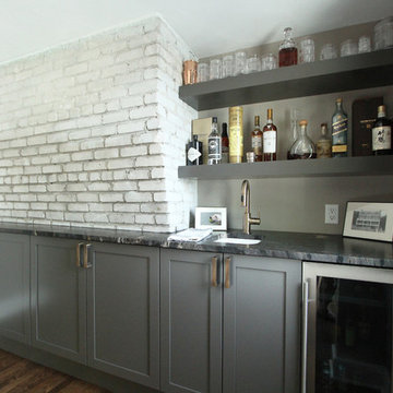 Exposed Brick Chimney behind Home Wet Bar