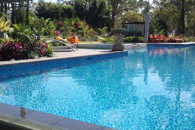 Large tropical backyard natural pool in Brisbane.