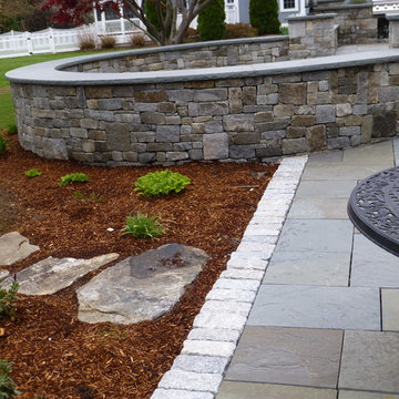 Bluestone Patio with Granite Cobblestone walls