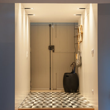 Marvila entry corridor with patterned tile and coat rack