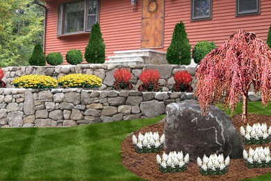 Inspiration for a large full sun stone landscaping in Boston.