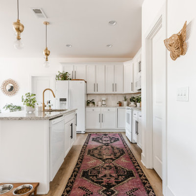 Example of a transitional kitchen design in New York
