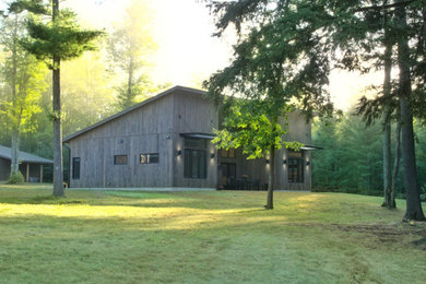 Example of a small trendy home design design in Grand Rapids
