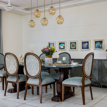The Dining Room, featuring a hand carved antique table.