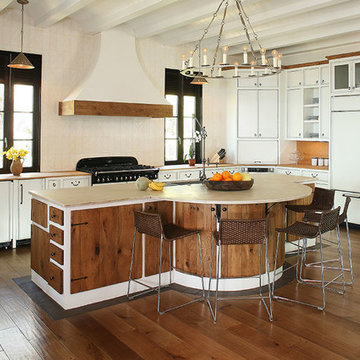Kitchen cabinets - mixed styles of stained wood and modern white