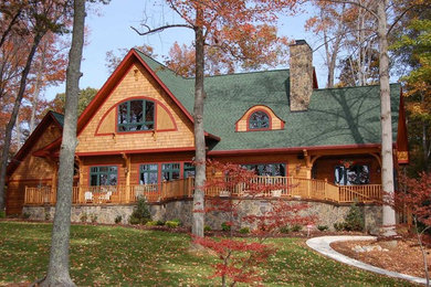 Inspiration for a mid-sized arts and crafts one-storey exterior in Charlotte with wood siding.