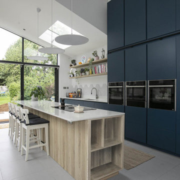 Matt blue and oak handleless kitchen
