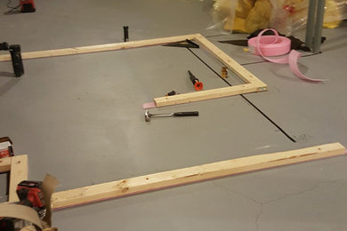 Example of an arts and crafts basement design in Toronto