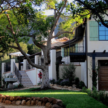 Santa Barbara Spanish Home with rural landscaping
