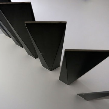 Floating stairs with triangular treads