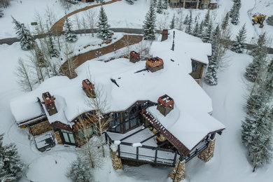 Mountain style home design photo in Salt Lake City