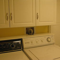 Laundry Cabinets With Built-In Ironing Board - Storage And Organization