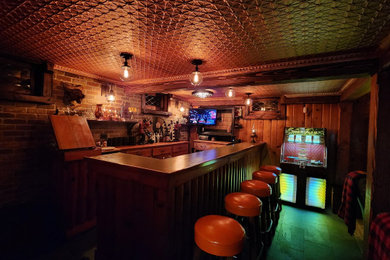 Example of a mountain style home bar design in Other