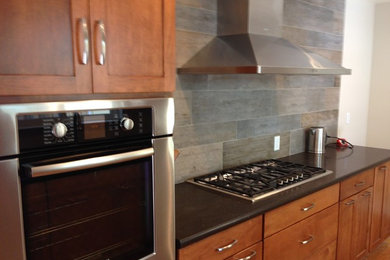 Inspiration for a contemporary kitchen remodel in San Francisco with brown cabinets