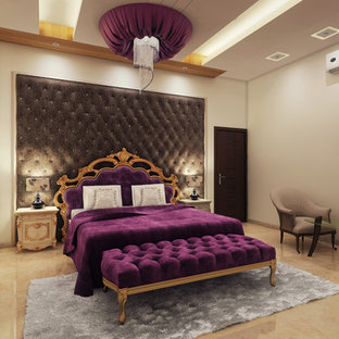 Ispirazione per una grande camera matrimoniale etnica con pareti beige e pavimento con piastrelle in ceramica
