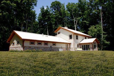 Example of an exterior home design in Other