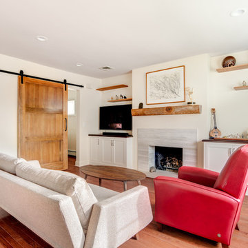 Wooden Mantel and Stone Fireplace Surround