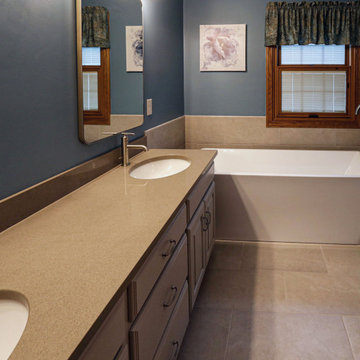 Updated Master Bath with Quartz Countertops, Freestanding Tub & Tiled Shower