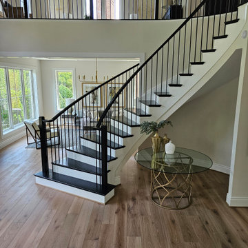 Project #130 | Curved Staircase with Wraparound Balcony