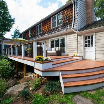 Design Builders mahogany screened porch & Zuri deck in Potomac MD