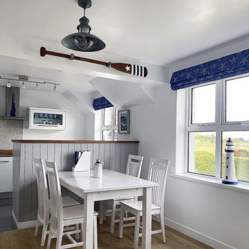 Coastal apartment kitchen + living