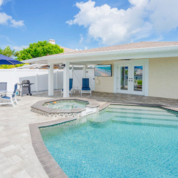Contemporary Backyard Escape with Poolside Lounge and Modern Patio Design