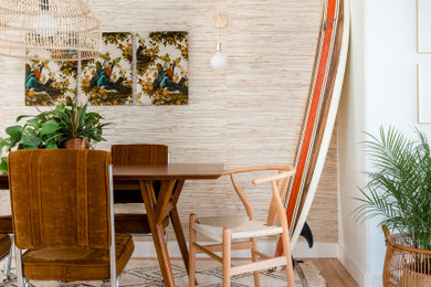 Beach style light wood floor and beige floor kitchen/dining room combo photo in Sacramento with beige walls and no fireplace