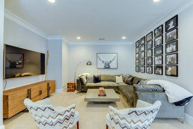 Inspiration for a transitional family room remodel in Charlotte