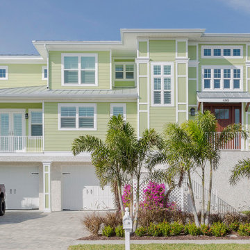 Pastel Green Coastal Home with Elevated Entry