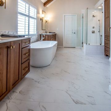 Luxury Spa Bathroom with Natural Warm Vanities, Quartz Countertop, Tiled Shower