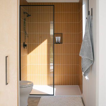 Walk-In Shower with Warm Yellow Glass Tile