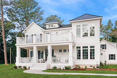 Example of a beach style home design design in Other