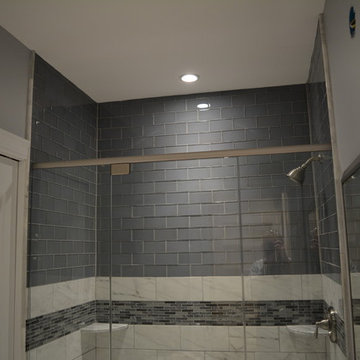 Bathroom and Frameless Glass Tiled Shower