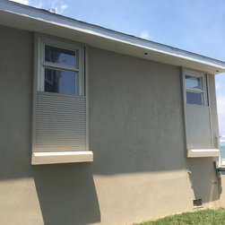 Motorized Rolling Hurricane Shutters- Mulheron Home - Products