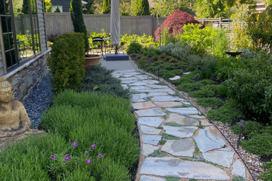 Example of a french country home design design in Seattle