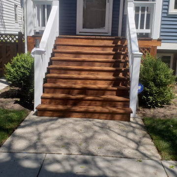 Evanston front porch power wash, staining and painting.