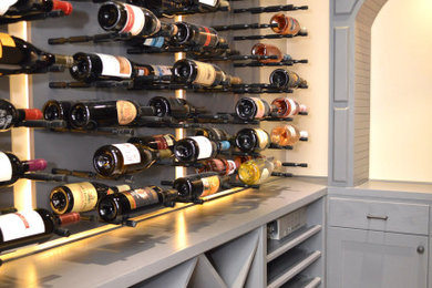 Photo of a contemporary wine cellar in Orange County.